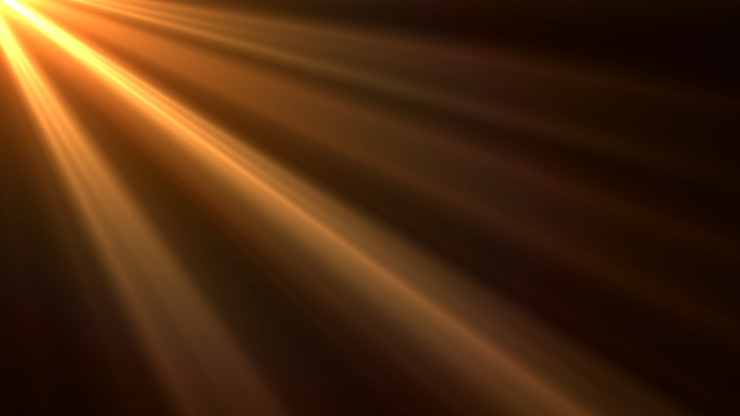 rays of light on a black background