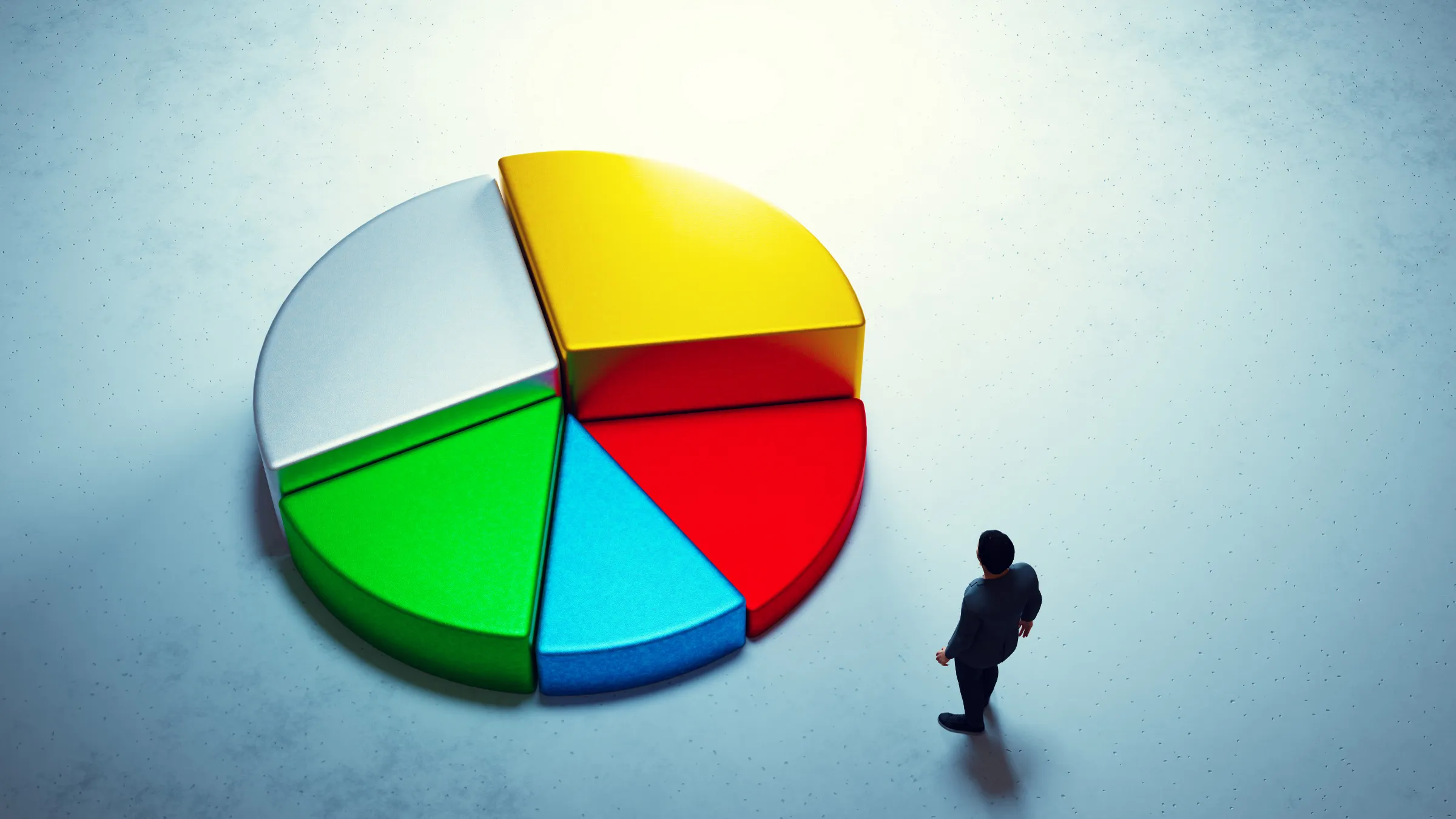 man observing large 3D pie chart